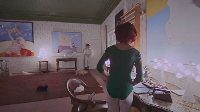 A Clockwork Orange - Cat Lady Miriam Karlin surprised by Alex Malcolm McDowell in room with her surrounded by cats