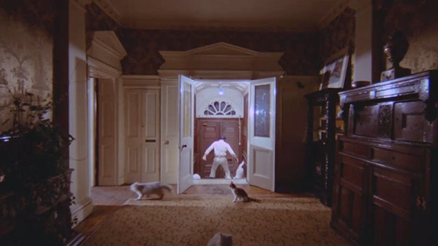 A Clockwork Orange - Alex Malcolm McDowell running through hall to front door with numerous cats