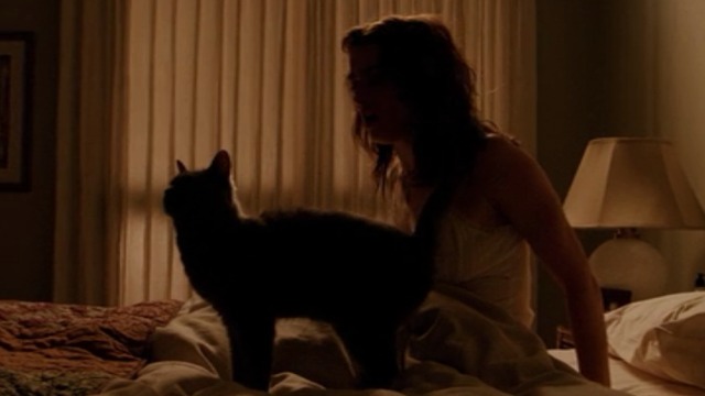 Constantine - Angela Rachel Weisz awakens from bad dream with Russian Blue cat Duck on bed