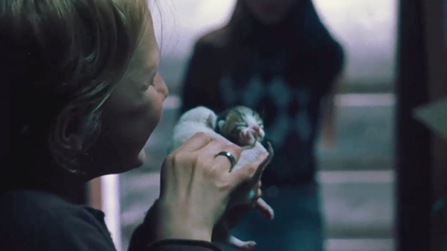 Corpo Celeste - Marta Yle Vianello holding up newborn kittens
