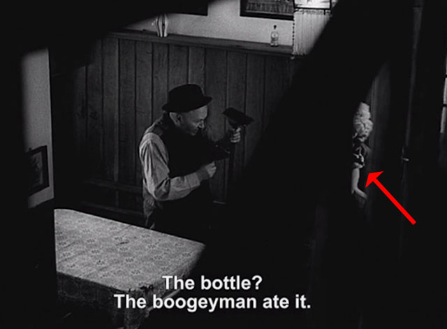 Courage for Every Day - Bytná Olga Scheinpflugová behind railing holding white and black cat Micinka with Eduard Václav Trégl