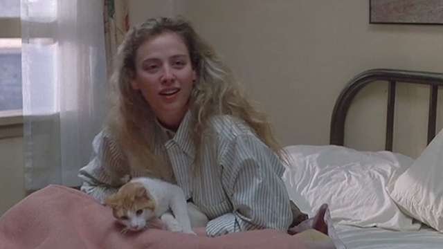 Creator - orange and white cat Ulysses in bed with Barbara Virginia Madsen
