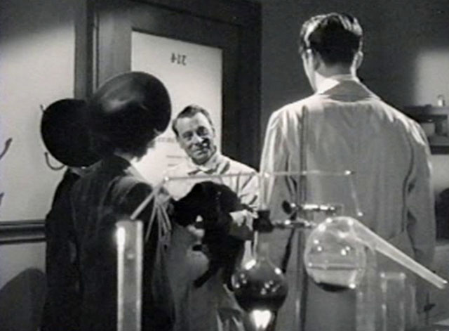 The Creeper - Dr. Van Glock Eduardo Ciannelli holding black cat with white paw with Dr. Reade John Baragray and a terrified Nora Janis Wilson
