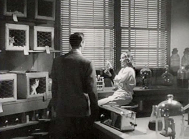 The Creeper - Gwen June Vincent and Dr. Reade John Baragray in lab with numerous cats inside cages
