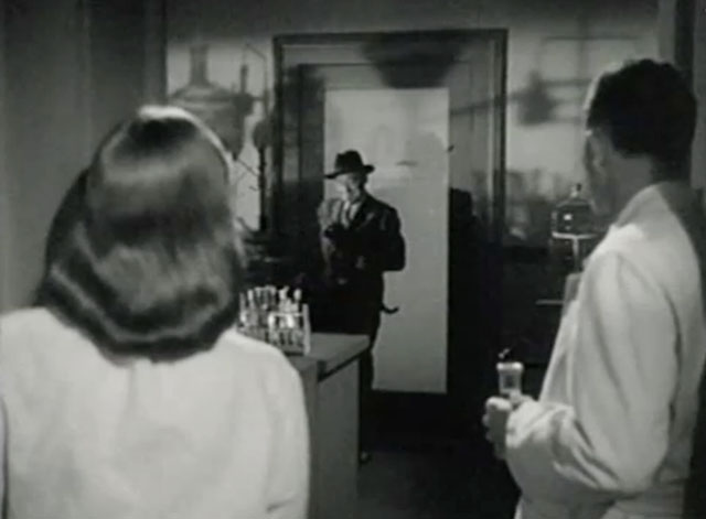 The Creeper - Gwen June Vincent and Dr. Bordon Onslow Stevens interrupted by Dr. Von Brock Eduardo Ciannelli holding black cat with white paw Creeper