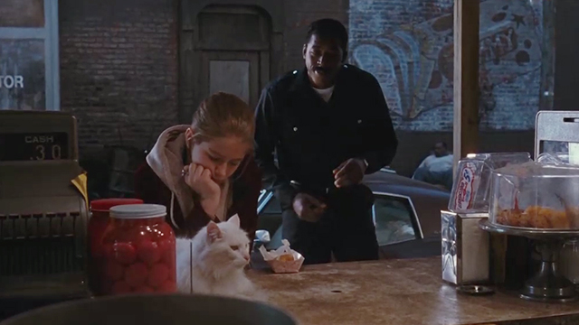 The Crow - Sarah Rochelle Davis with white Turkish Angora cat Gabriel at hot dog stand with Officer Albrecht Ernie Hudson