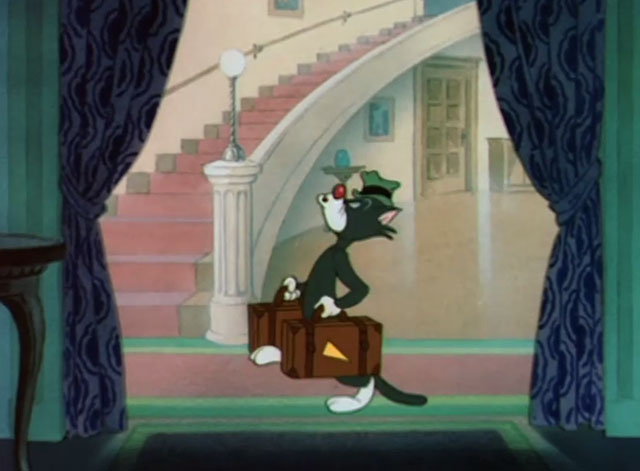 The Cuckoo Clock - black and white cat with hat and suitcases pretending to leave
