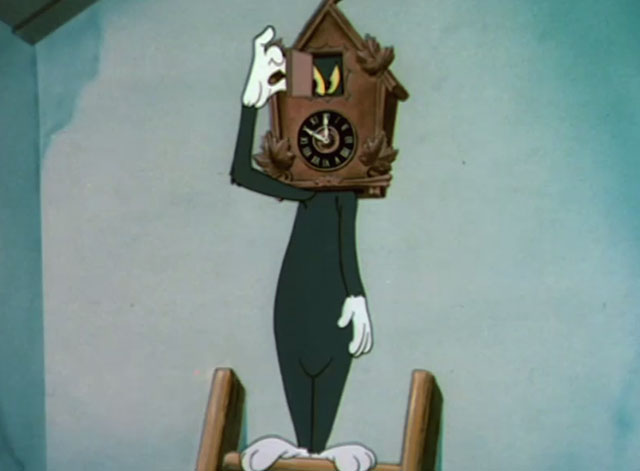 The Cuckoo Clock - black and white cat with head inside cuckoo clock