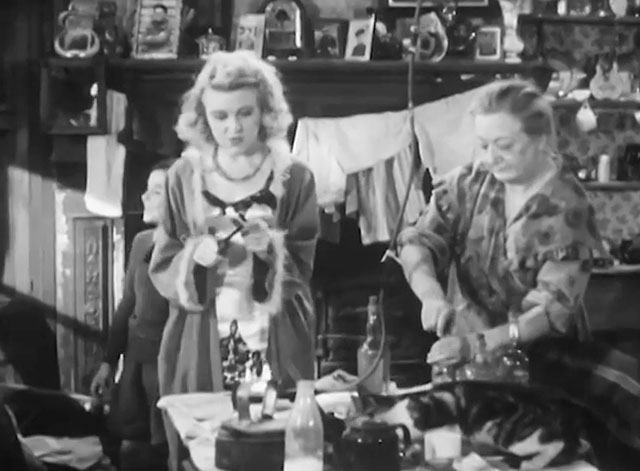 The Cure for Love - Janey Dora Bryan with tabby and white cat eating on table and mother Gladys Henson