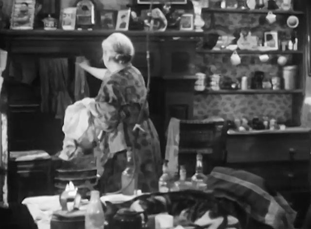 The Cure for Love - tabby and white cat eating on table and mother Gladys Henson
