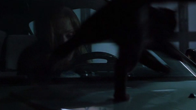 Darkness Falls - black cat jumping on hood of car scaring Caitlin Emma Caulfield