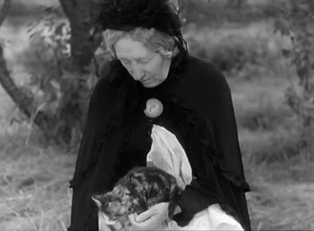 A Day in the Country - grandmother Gabrielle Fontan sleeping with tabby kitten about to jump out of her lap