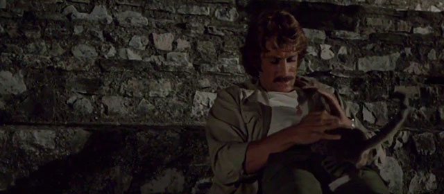 The Dead are Alive - L'etrusco uccide ancora - Jason Alex Cord petting small tabby and white cat
