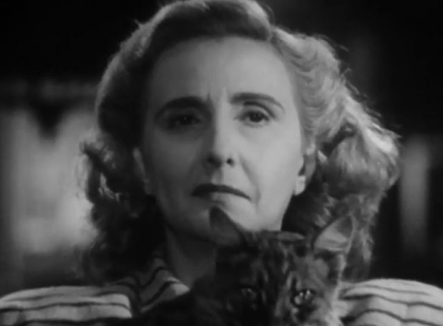 Death Walks in the Rain - La muerte camina en la lluvia - longhair tabby cat with Valeria Duval Margarita Corona