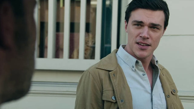 Deep Water - ginger tabby cat in window behind Tony Finn Wittrock