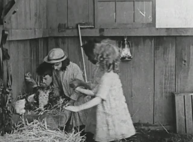 Deliverance - Helen Keller Etna Ross approaching mama cat and kittens in barn