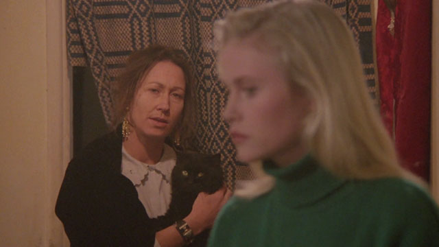 Demonia - Lilla Carla Cassola holding longhair black cat with Liza Meg Register