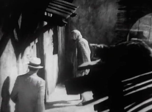 The Devil's in Love - tabby cat on roof above Captain Radak C. Henry Gordon and thug