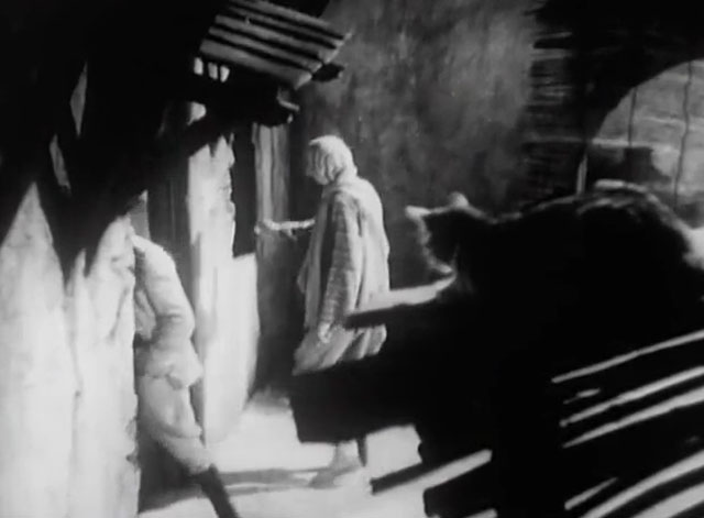 The Devil's in Love - tabby cat on roof above Captain Radak C. Henry Gordon and thug