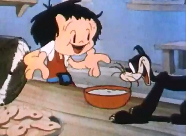 Dick Whittington's cat - Dick Whittington giving cartoon black cat a bowl of milk