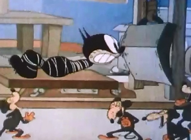 Dick Whittington's cat - cartoon black cat about to be killed by machine