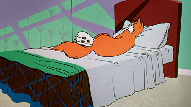 Dime to Retire - ginger and white cartoon cat lying on bed