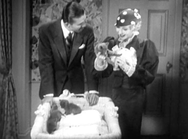 Disgraced - Gay Helen Twelvetrees and Kirk Bruce Cabot looking at kittens in bassinet