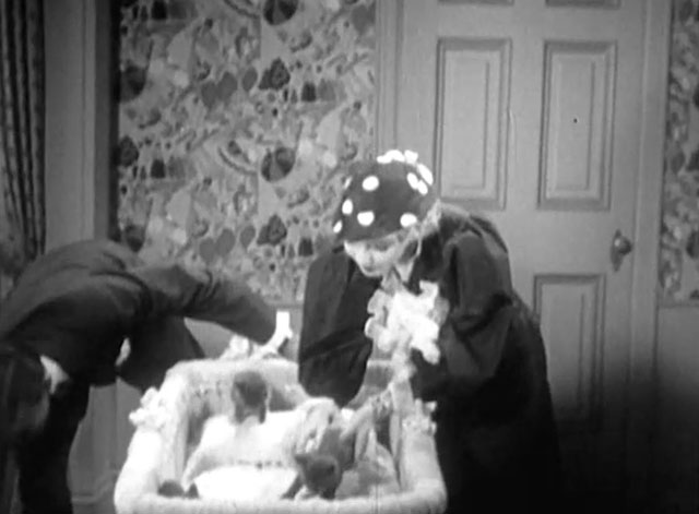 Disgraced - Gay Helen Twelvetrees and Kirk Bruce Cabot looking at kittens in bassinet