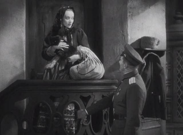 Dishonored - long-haired black cat Blackie being carried by Marie Marlene Dietrich with Colonel Kranau Victor McLaglen