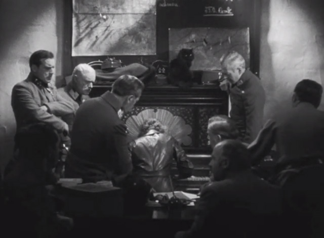 Dishonored - long-haired black cat Blackie on top of piano played by Marie Marlene Dietrich with military men