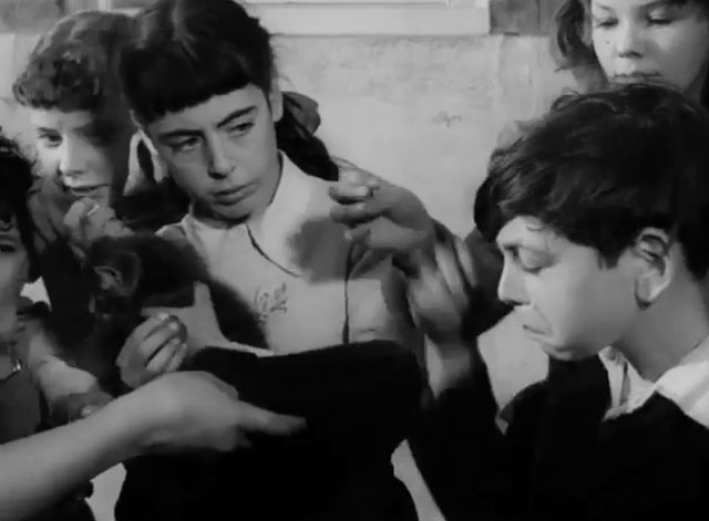 The Dog and the Diamonds - Linda Molly Osborne holding kitten Frisky with other kids and their pets