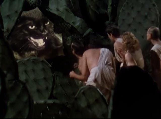 Dr. Cyclops - black cat Satanas squeezing through hole in wall