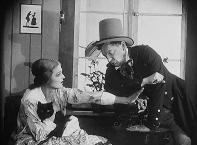 Eerie Tales - Unheimliche Geschichten - drunk Reinhold Schunzel about to hit Anita Berber holding black cat