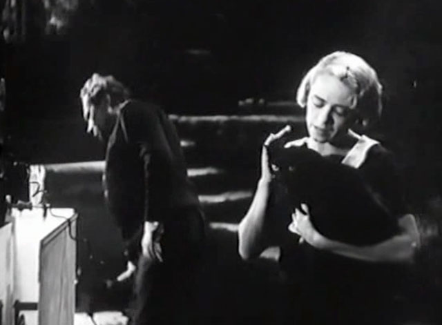 Eerie Tales - Unheimliche Geschichten - Betty Roma Bahn holding black cat in laboratory with Morder Paul Wegener