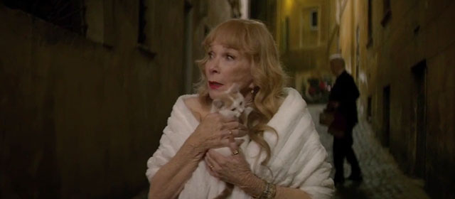 Elsa and Fred - Shirley Maclaine holding ginger and white kitten with Christopher Plummer