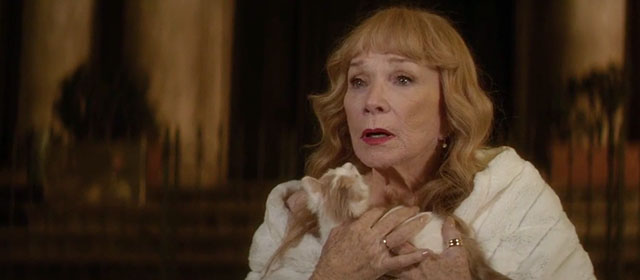 Elsa and Fred - Shirley Maclaine holding ginger and white kitten