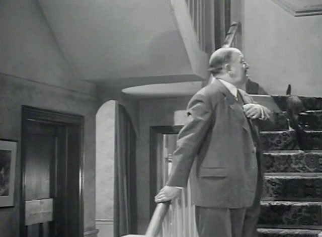 The Embezzler - Henry Charles Victor on stairs with tuxedo cat