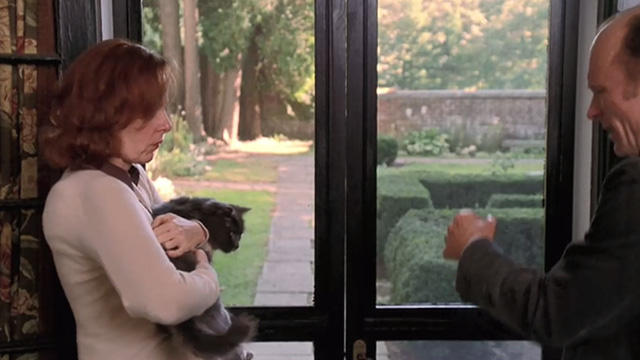 Empire Falls - long haired gray cat Timmy held by Cindy Kate Burton after scratching Miles Ed Harris