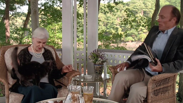 Empire Falls - long haired gray cat Timmy jumping up in Francine Joanne Woodward lap and scaring Miles Ed Harris