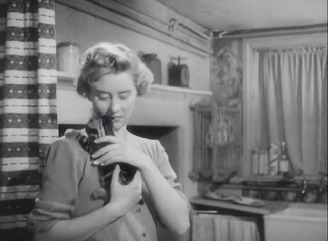 The End of the Road - Molly Naomi chance holding tabby kitten on shoulder