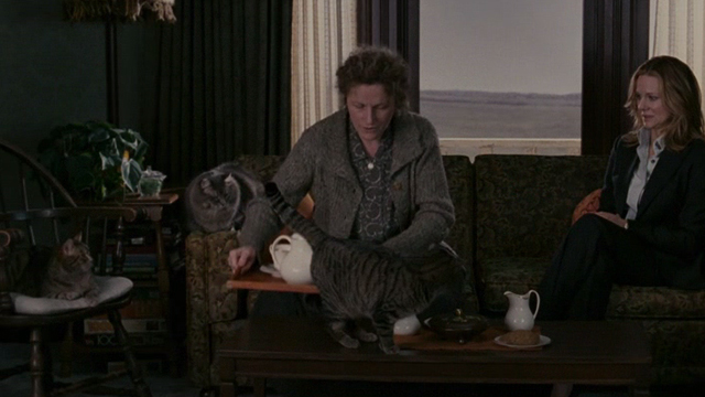 The Exorcism of Emily Rose - Erin Laura Linney with Emily's mother sitting on couch with three cats