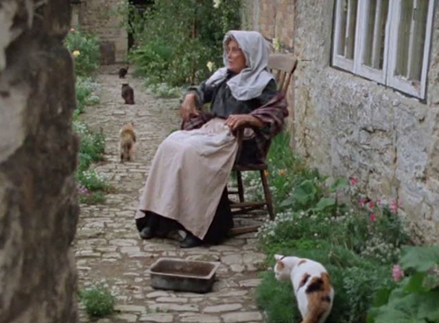 Exploits at West Poley - old woman Diana King with cats running away
