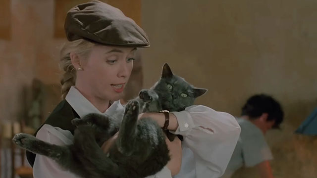 Face the Music - Julie Lysette Anthony holding large gray cat Thelonious Gros Minet