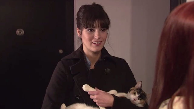 Failing Better Now - Mia Lindsay Michelle Nader holding calico cat Melanie