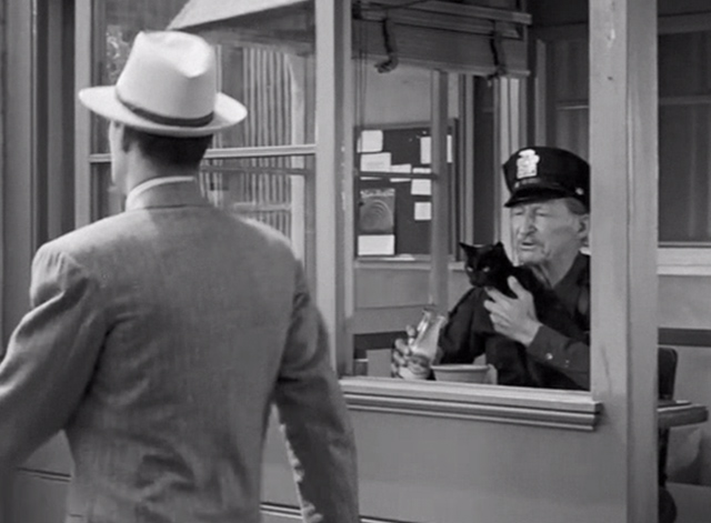 The Falcon in Hollywood - studio watchman Ed Johnson Walter Soderling with black cat in booth