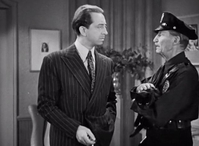 The Falcon in Hollywood - Martin S. Dwyer John Abbott with studio watchman Ed Johnson Walter Soderling holding black cat