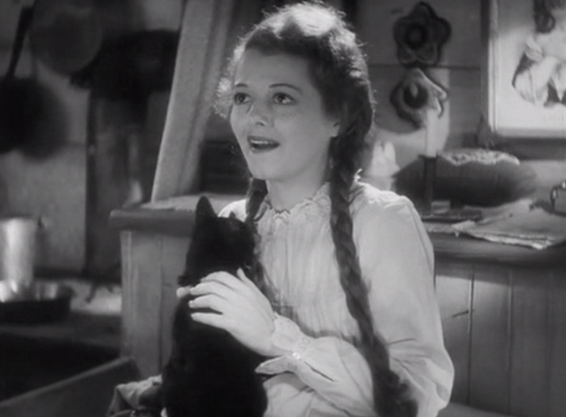 The Farmer Takes a Wife - Molly Janet Gaynor with tuxedo kitten in bed