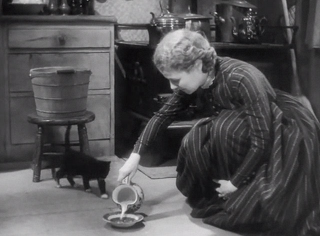 The Farmer Takes a Wife - Molly Janet Gaynor pouring milk for tuxedo kitten on floor