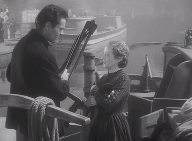 The Farmer Takes a Wife - Molly Janet Gaynor holding tuxedo kitten while talking to Dan Henry Fonda