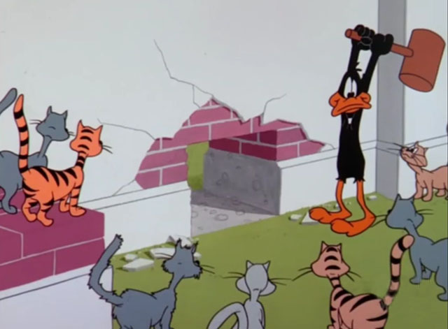 Fast Buck Duck - Daffy Duck holding mallet by wall surrounded by cartoon cats